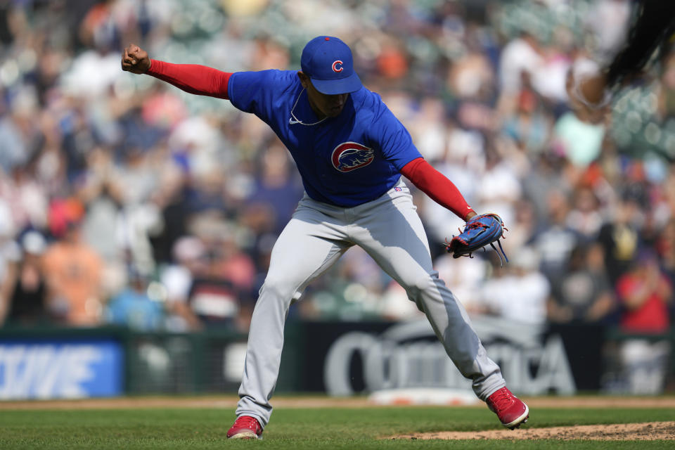 Chicago Cubs relief pitcher Adbert Alzolay reacts to the final out against the Detroit Tigers in the ninth inning of a baseball game, Wednesday, Aug. 23, 2023, in Detroit. (AP Photo/Paul Sancya)