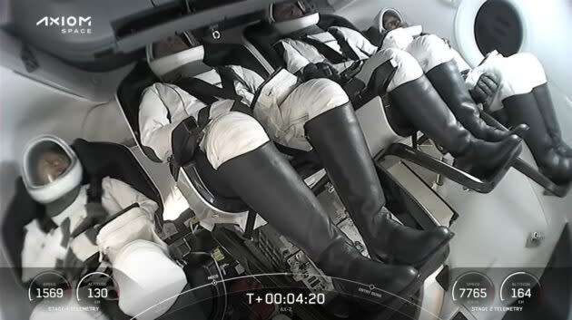 A camera inside the Crew Dragon capsule shows the Ax-2 crew after liftoff. (Axiom Space via YouTube)