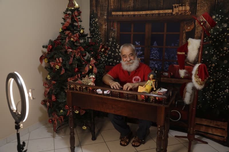 The Wider Image: Christmas wishes from Santas around the world