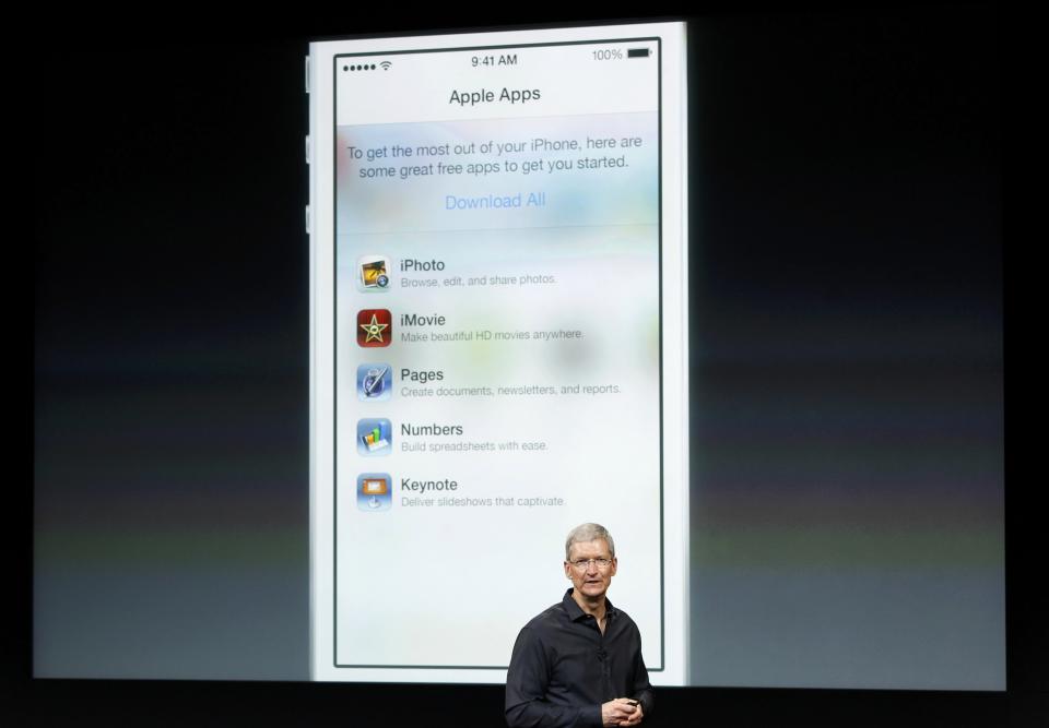 Apple Inc CEO Tim Cook speaks on stage during Apple Inc's media event in Cupertino