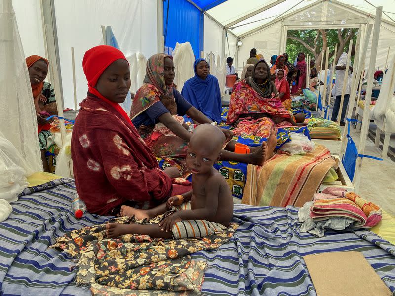 Patients sit on the beds at a makeshift MSF hospital on the day U.S. Ambassador to the United Nations Thomas-Greenfield visited the hospital, in Adre