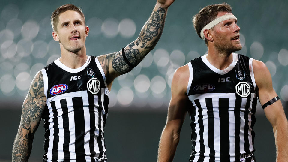 Port Adelaide players, pictured here wearing the historic guernsey against Adelaide in 2020.