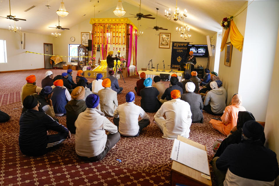 Members of the Sikh Coalition gather at the Sikh Satsang of Indianapolis in Indianapolis, Saturday, April 17, 2021 to formulate the groups response to the shooting at a FedEx facility in Indianapolis that claimed the lives of four members of the Sikh community. A gunman killed eight people and wounded several others before taking his own life in a late-night attack at a FedEx facility near the Indianapolis airport. (AP Photo/Michael Conroy)