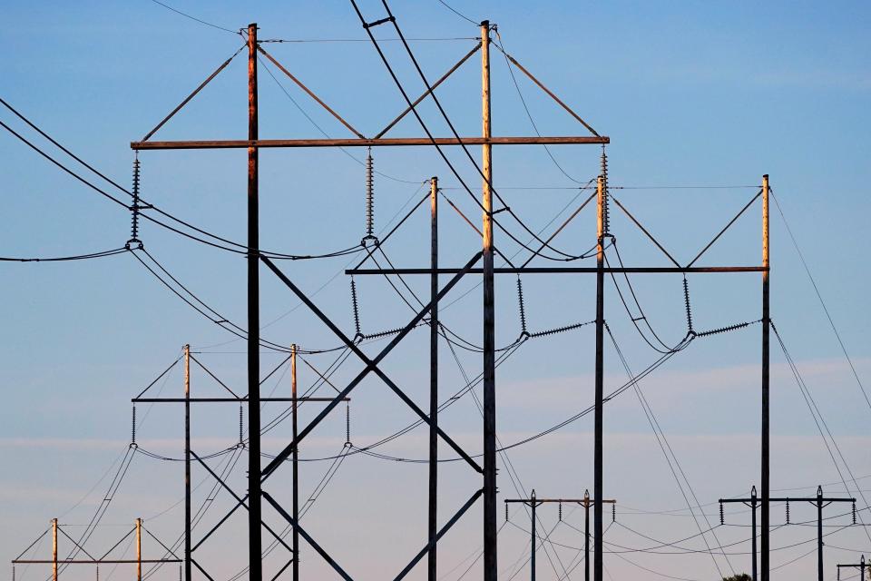 Central Maine Power utility lines are seen Wednesday, Oct. 6, 2021, in Pownal, Maine.