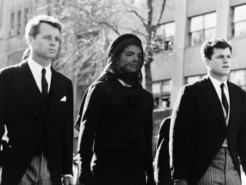Robert and Edward Kennedy with Jackie Kennedy during the funeral of President John F. Kennedy.
