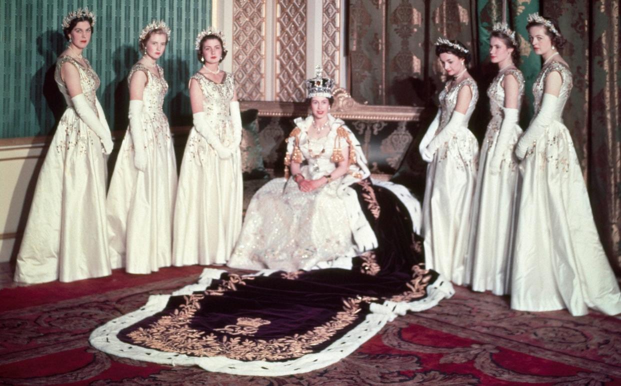 Lady Mary Russell, then Lady Mary Baillie-Hamilton, stands to the right of Queen Elizabeth II in Cecil Beaton's photograph; the other maids of honour, from left to right, were Lady Moyra Hamilton (later Lady Moyra Campbell, now deceased), Lady Anne Coke (now The Rt Hon The Lady Glenconner), Lady Jane Vane-Tempest-Stewart (now The Rt Hon The Lady Rayne), Lady Jane Heathcote-Drummond-Willoughby (now The Rt Hon The Baroness Willoughby de Eresby) and Lady Rosemary Spencer-Churchill (now Lady Rosemary Muir) - Cecil Beaton 