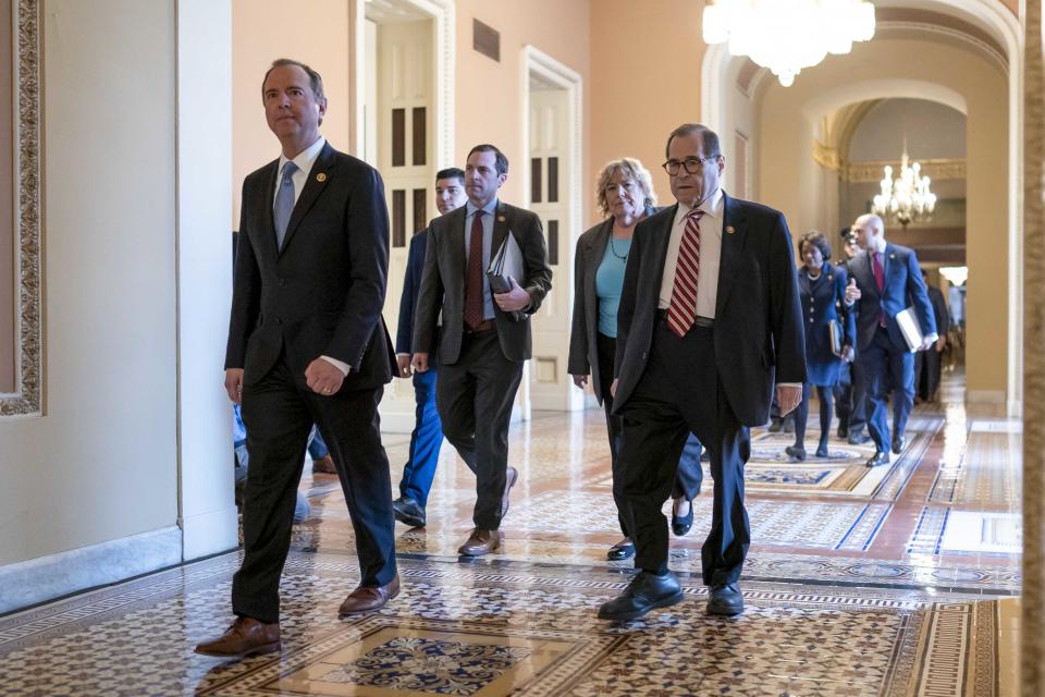 House Democratic impeachment managers, from left, House Intelligence Committee Chairman Adam Schiff, D-Calif., Rep. Jason Crow, D-Colo., Rep. Zoe Lofgren, D-Calif., and House Judiciary Committee Chairman Jerrold Nadler, D-N.Y., arrive for the start of the third day of the impeachment trial of President Donald Trump on charges of abuse of power and obstruction of Congress, at the Capitol in Washington, Thursday, Jan. 23, 2020. (AP Photo/J. Scott Applewhite)