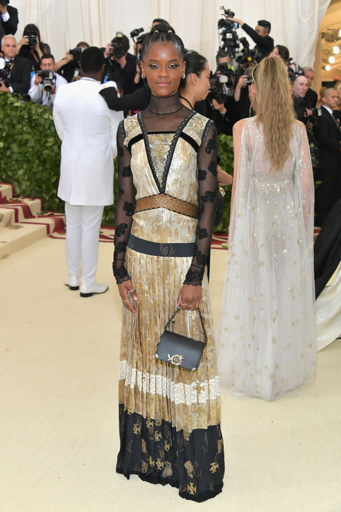 <p>Attending her first Met Gala, Wright wore a custom dress by Chanel with hand embroidered crosses. (Photo: Getty Images) </p>