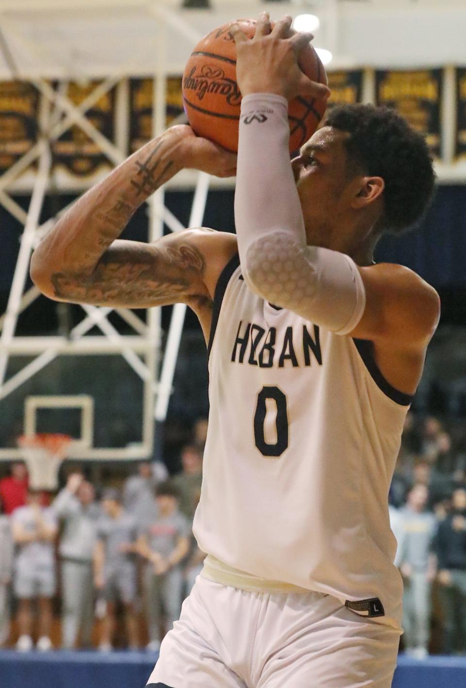 Hoban's Jonas Nichols shoots against Lake during a game earlier this season.