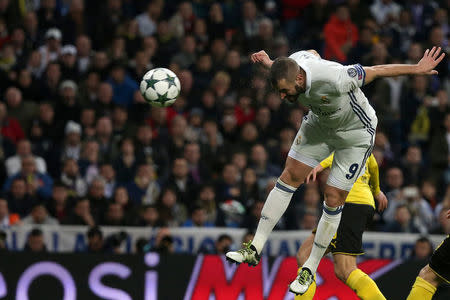 Football Soccer - Real Madrid v Borussia Dortmund - UEFA Champions League - Santiago Bernabeu stadium, Madrid, Spain - 7/12/16 Real Madrid's Karim Benzema scores during the match. REUTERS/Juan Medina