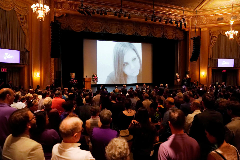 Mourners gather inside the Paramount Theater.&nbsp;