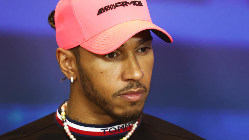 Lewis Hamilton looks on during a Formula One press conference.