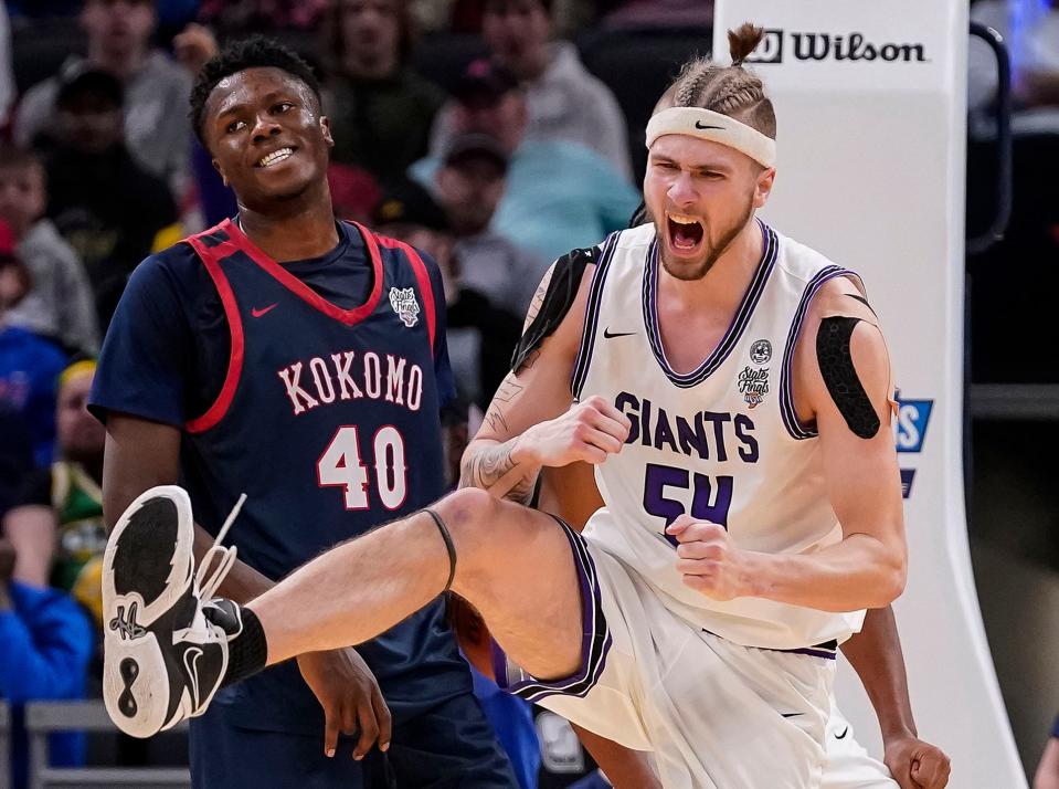 Ben Davis Giants center Zane Doughty (54) yells in excitement on Saturday, March 25, 2023 at Gainbridge Fieldhouse in Indianapolis. The Ben Davis Giants defeated the Kokomo Wildkats, 53-41, for the IHSAA Class 4A state finals championship. 