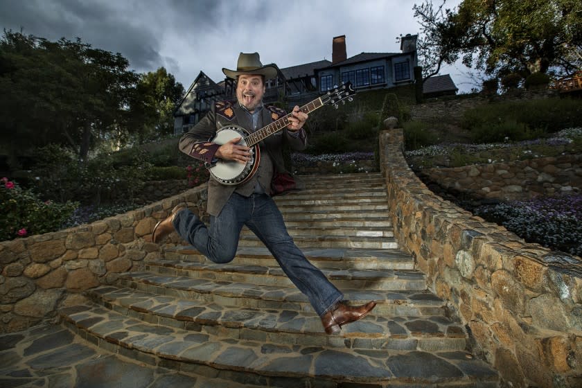 LOS ANGELES, CA - JANUARY 25, 2021: Jared Gutstadt, known as "Jingle Jared," is photographed at his Mandeville Canyon compound in Los Angeles. He created music for tv shows and is now running a podcast company where music artists record podcasts that are written like scripted musicals that feature their music. The company hopes that by doing this, their scripted podcasts can be made one day into tv shows or movies, while also helping market songs for up and coming artists that are featured in the podcasts. (Mel Melcon / Los Angeles Times)