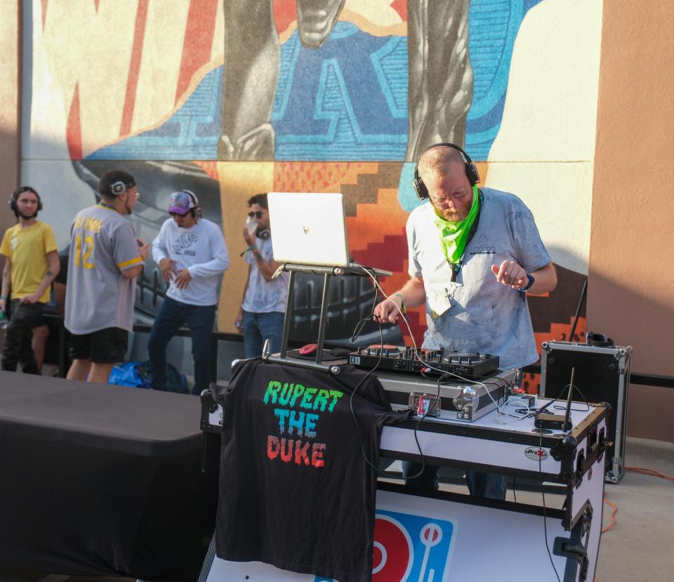 A DJ enjoys his music Saturday at the 4th annual Hoodoo Music Festival in downtown Amarillo.