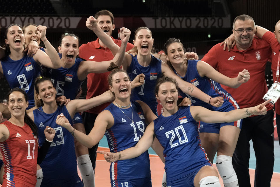 Players from Serbia celebrate after defeating Korea in the bronze medal match during women's volleyball at the 2020 Summer Olympics, Sunday, Aug. 8, 2021, in Tokyo, Japan. (AP Photo/Manu Fernandez)