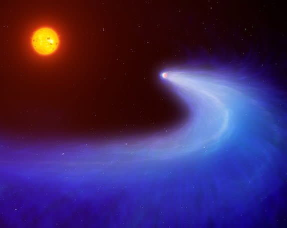 This artist's impression shows exoplanet GJ 436b, which is surrounded by a massive gas cloud that streams behind the planet like a comet's tail for millions of miles.