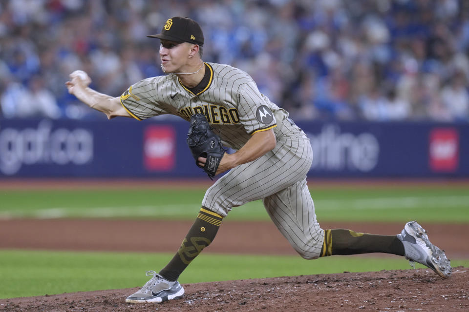 San Diego Padres relief pitcher Alek Jacob works against the Toronto Blue Jays during the eighth inning of a baseball game Tuesday, July 18, 2023, in Toronto. (Chris Young/The Canadian Press via AP)