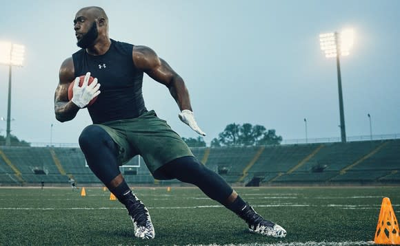 Football player wearing Under Armour shirt