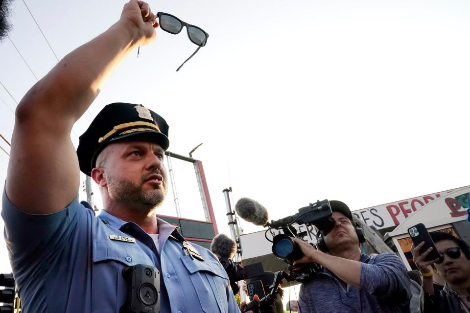 Minneapolis Police Chief Brian O'Hara raises his fist in solidarity on the three-year anniversary of George Floyd's death at George Floyd Square in Minneapolis.