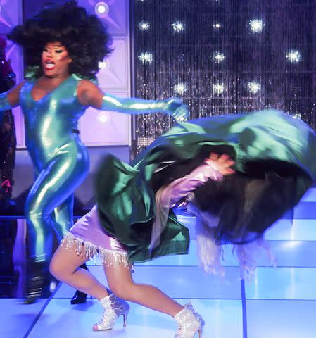 <p>MTV</p> Mhi'ya Iman Le'Paige throws her dress on Morphine Love Dion on 'RuPaul's Drag Race'