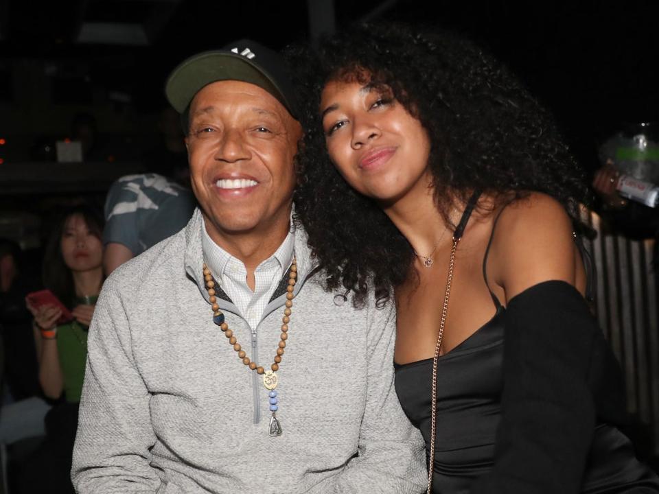 Russell Simmons and Aoki Lee Simmons attend Champ Medici And Fam Lounge at Marquee on June 19, 2022 in New York City.