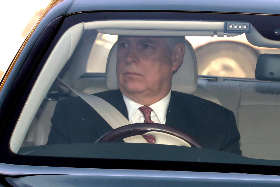 The Duke of York drives his Bentley into the Buckingham Palace grounds in London as he arrives for Queen Elizabeth II's Christmas lunch.&nbsp;The Duke and Duchess of Cambridge, Prince George, Princess Charlotte, Princess Anne and Princess Beatrice also attended the lunch, among others. (Photo: Aaron Chown - PA Images via Getty Images)