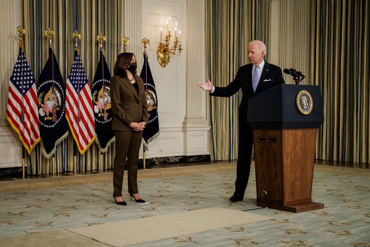 President Joe Biden acknowledges Vice President Kamala Harris during a press conference in the State Dining Room at the White House on Nov. 6, in Washington. The president spoke after his Infrastructure bill was finally passed in the House of Representatives after negotiations with lawmakers on Capitol Hill went late into the night.