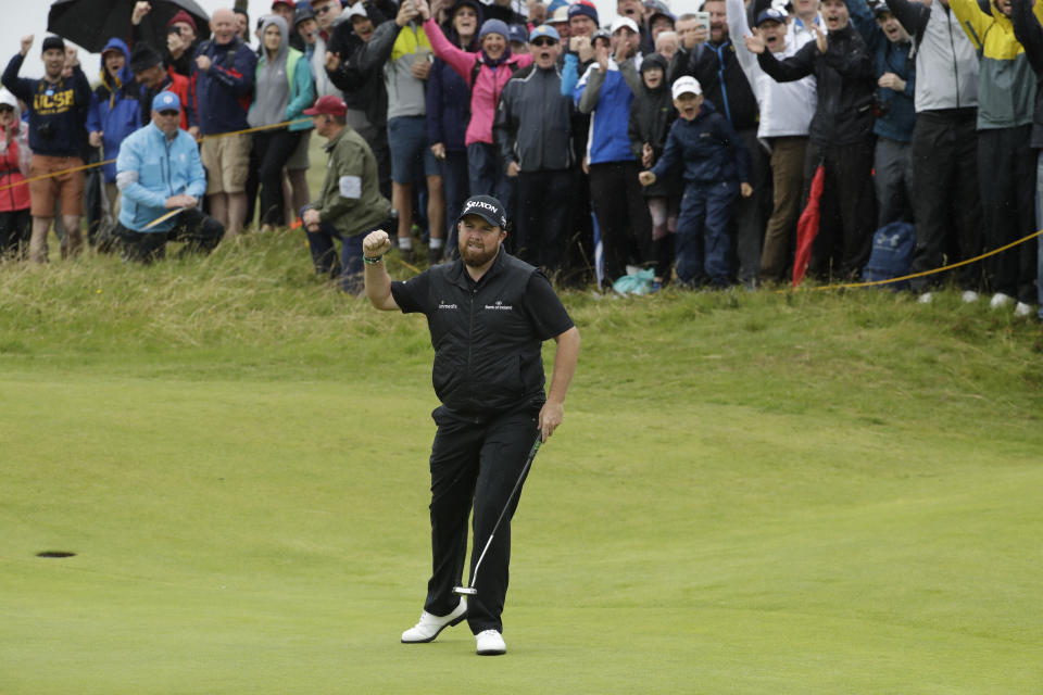 Ireland's Shane Lowry celebrates after making a birdie at the 10th hole during the second round of the British Open Golf Championships at Royal Portrush in Northern Ireland, Friday, July 19, 2019.(AP Photo/Matt Dunham)