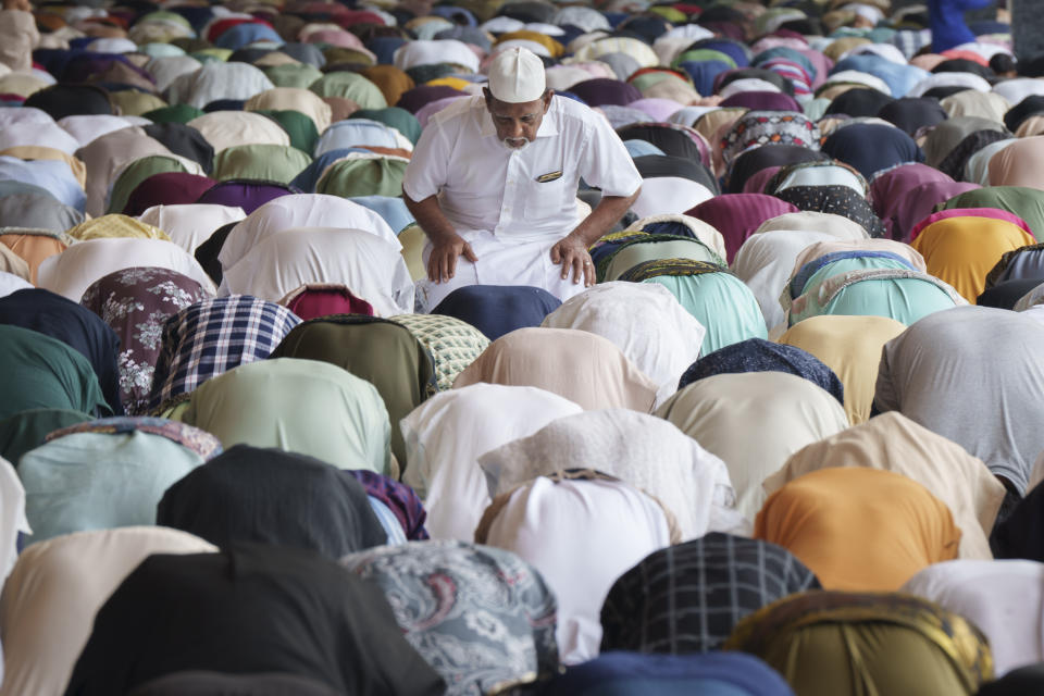 Muslims offer prayers at National Mosque for the Eid al-Fitr, marking the end the holy fasting month of Ramadan in Kuala Lumpur, Malaysia, Wednesday, April 10, 2024. (AP Photo/Vincent Thian)