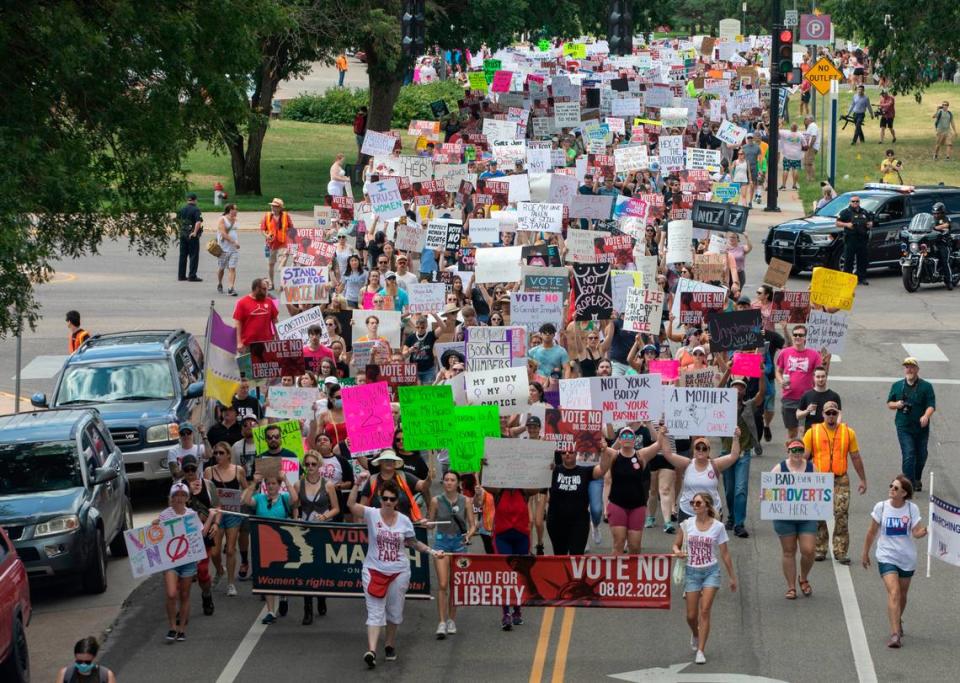 Dr. Sabrina Markese of Olathe walked in “vote no” rallies in Topeka and Wichita, shown here, as she let her pro-choice stance on abortion be known publicly for the first time.