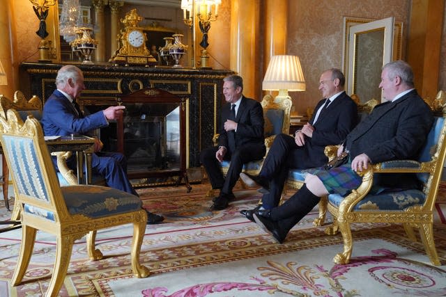 The King speaking with Labour leader Keir Starmer, Liberal Democrat Leader Sir Ed Davey, and the then-SNP Westminster leader Ian Blackford, during an audience with opposition leaders after the late Queen's death