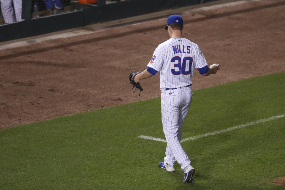 Chicago Cubs starting pitcher Alec Mills leaves during the seventh inning of a baseball game against the Minnesota Twins, Saturday, Sept. 19, 2020, in Chicago. (AP Photo/Kamil Krzaczynski)