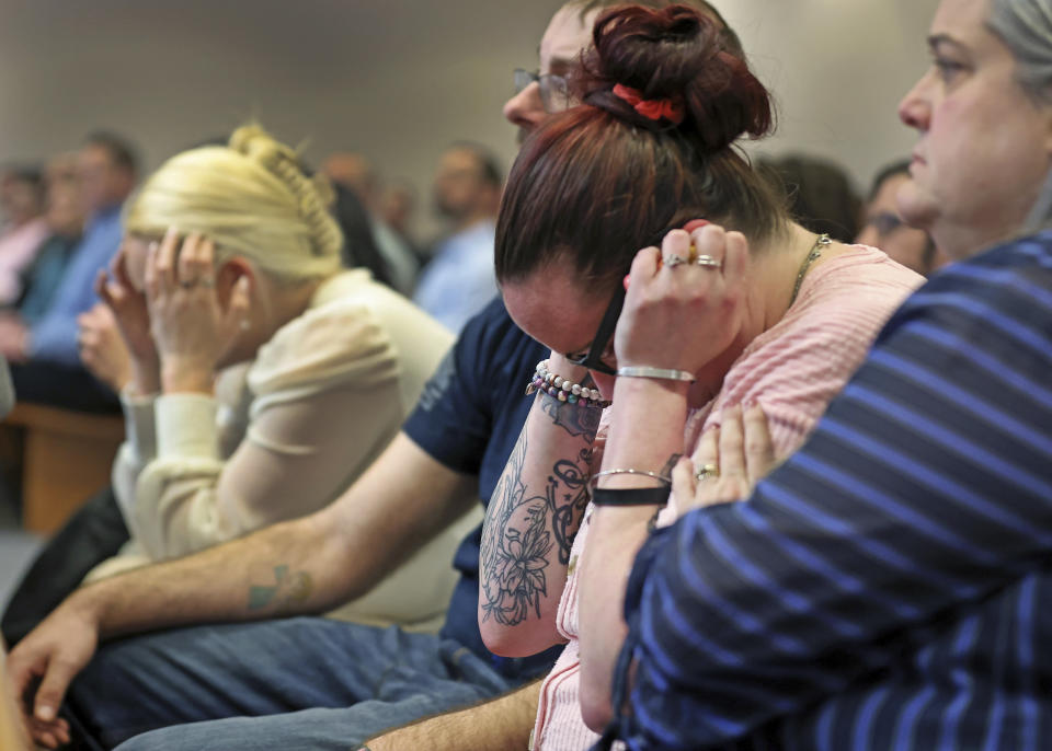 Crystal Sorey, Harmony Montgomery's biological mother, covers her ears as prosecutors present their closing argument in Adam Montgomery's trial, Wednesday, Feb. 21, 2024, in Manchester, N.H. Montgomery is accused of killing his 5-year-old daughter Harmony. (Jim Davis/The Boston Globe via AP, Pool)