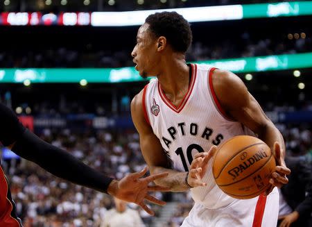 Jan 22, 2016; Toronto, Ontario, CAN; Toronto Raptors guard DeMar DeRozan (10) protects the ball against the Miami Heat at the Air Canada Centre. Toronto defeated Miami 101-81. Mandatory Credit: John E. Sokolowski-USA TODAY Sports