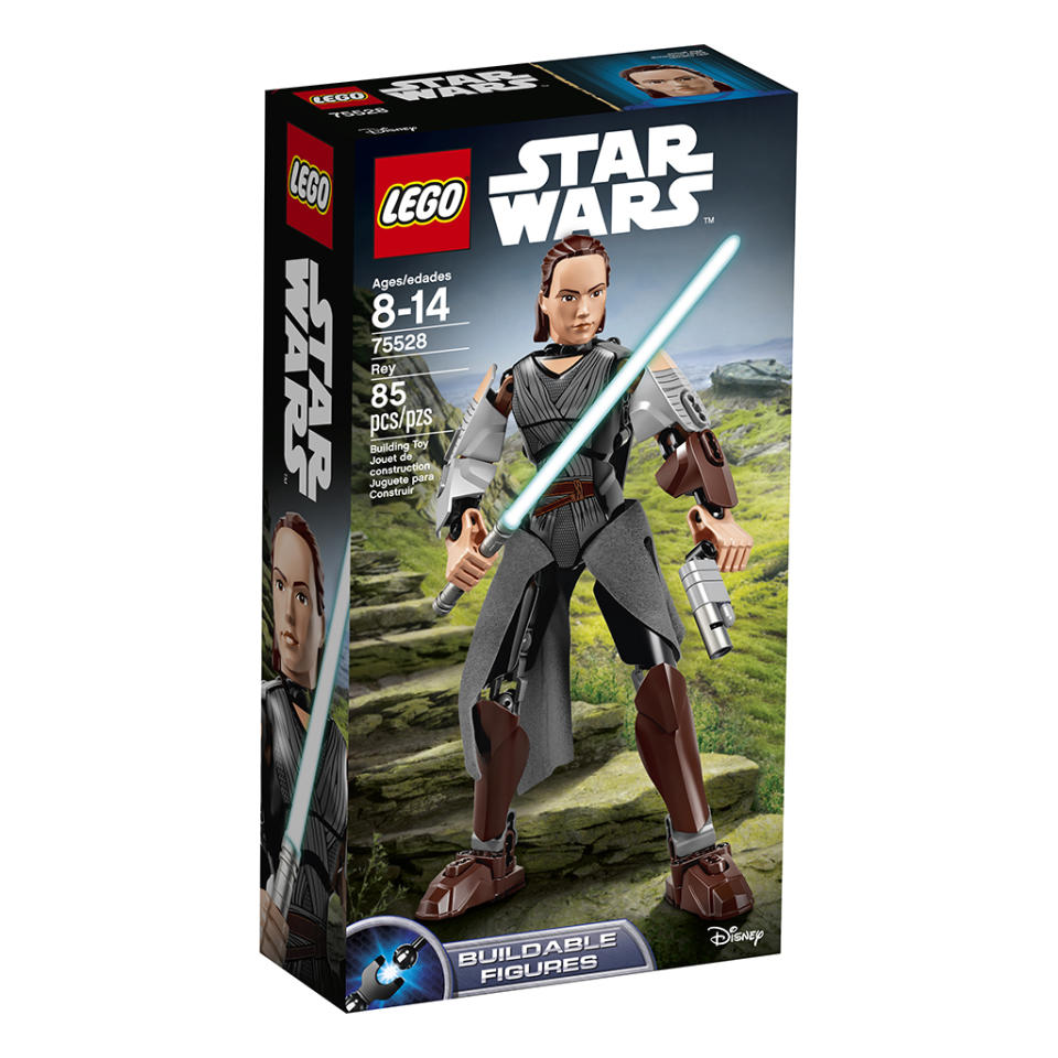 <p>“Awaken the power of the Force with buildable action hero Rey! Put her in a battle pose and gear her up with her blue Lightsaber and blaster pistol. If she runs into trouble, turn the wheel to take a swing at the First Order troopers!” $24.99 (Photo: Lego) </p>