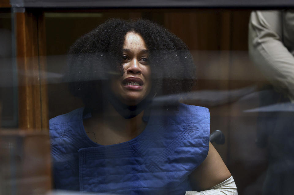 Nicole Linton appears in Los Angeles Superior Court for arraignment on murder charges stemming from a traffic accident, Monday, Aug. 8, 2022, in Los Angeles. Linton, suspected of causing a fiery crash that killed five people and an 8 1/2-month-old fetus near Los Angeles, has been charged with murder, as well as vehicular manslaughter, and is being held on $9 million bail. (Frederick M. Brown/Daily Mail.com via AP, Pool)