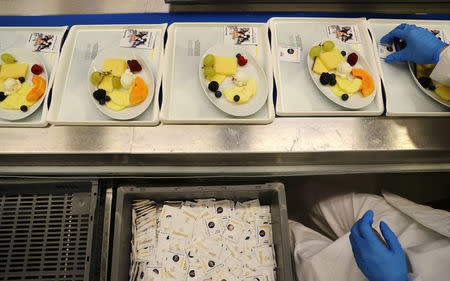 Meals are prepared by employees of LSG Group, Lufthansa's airline catering division, at the LSG headquarters in Frankfurt, Germany, November 11, 2016. Picture taken November 11, 2016. REUTERS/Kai Pfaffenbach