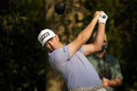 Michael Thompson watches his tee shot on the seventh hole during the first round of the Masters golf tournament on Thursday, April 8, 2021, in Augusta, Ga. (AP Photo/David J. Phillip)