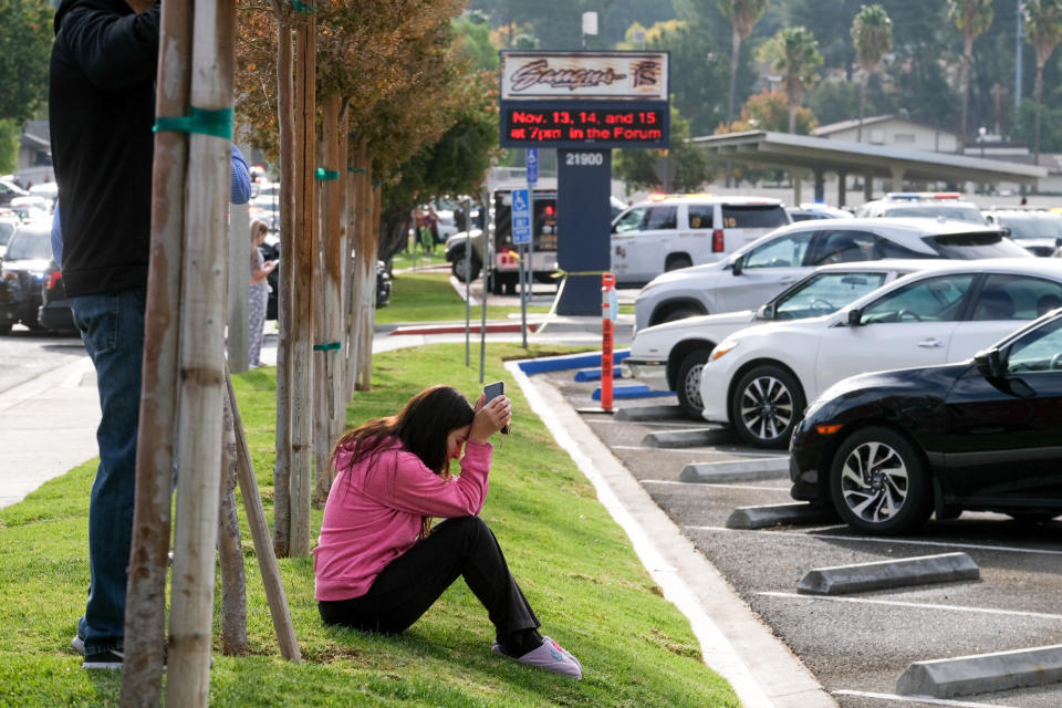 A parent waits outside of Saugus High School in Santa Clarita, California, on Thursday, after an active shooter was reported at the school about 7:30 a.m. (Photo: Los Angeles Daily News via Getty Images)