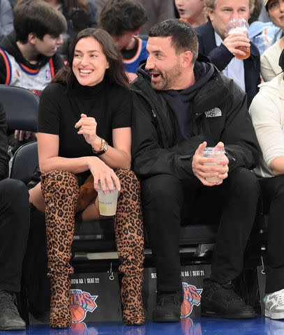 <p>Michael Simon/Shutterstock</p> Irina Shayk and Riccardo Tisci at Madison Square Garden in New York City on Nov. 6