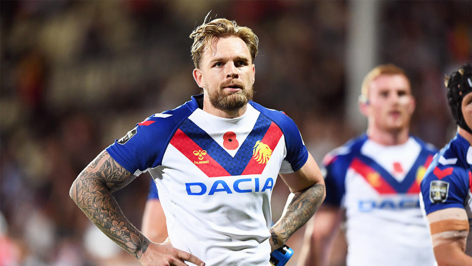 Blake Austin looks dejected after conceding a try. (Photo by Kai Schwoerer/Getty Images)