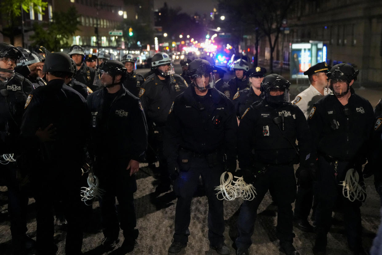 Police maintain a cordon around Columbia University.