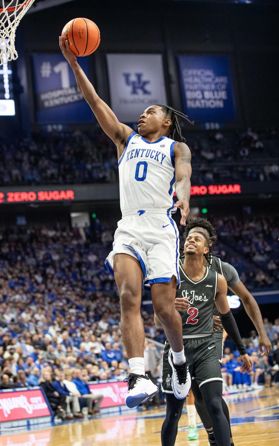 Kentucky freshman Rob Dillingham scores on a layup Monday night. The Wildcats outlasted Saint Joseph's in overtime, 96-88.