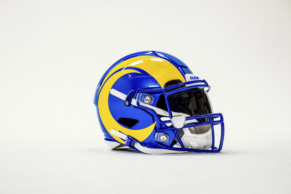 This undated graphic image released by the Los Angeles Rams NFL football team shows the team's new helmet color scheme. The Rams have unveiled new uniforms ahead of their move into SoFi Stadium this year. (Los Angeles Rams via AP)