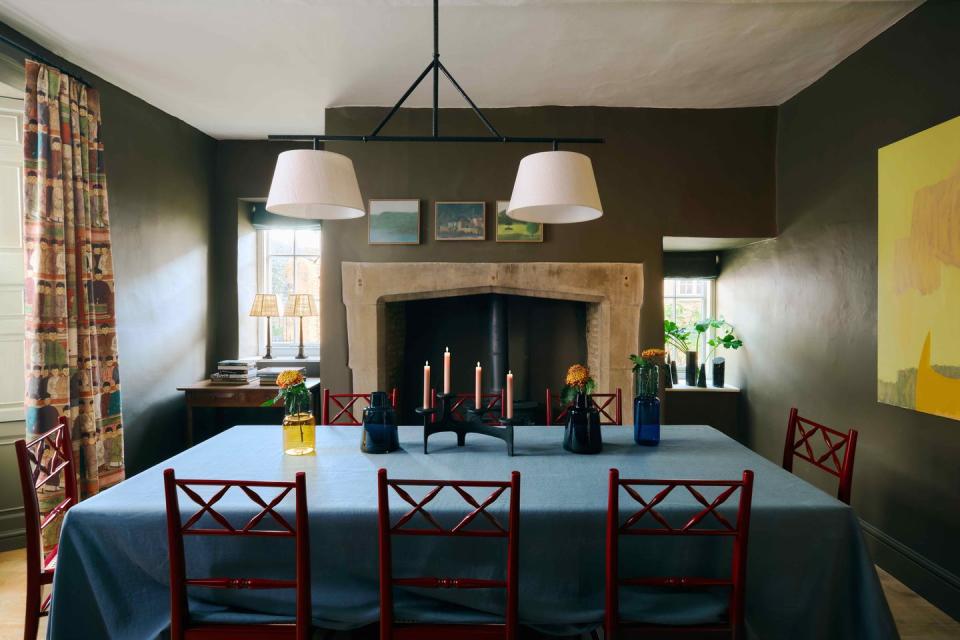 a dining room with a fireplace