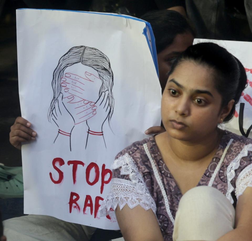 Protester attends a protest against rape and murder of doctor in Kolkata (EPA)