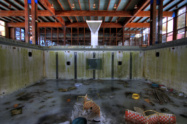 Abandoned lounge chairs are literally frozen in time at the bottom of Grossinger's once-majestic pool. (Photo: Jonathan Haeber/Flickr, www.terrastories.com/grossingers)