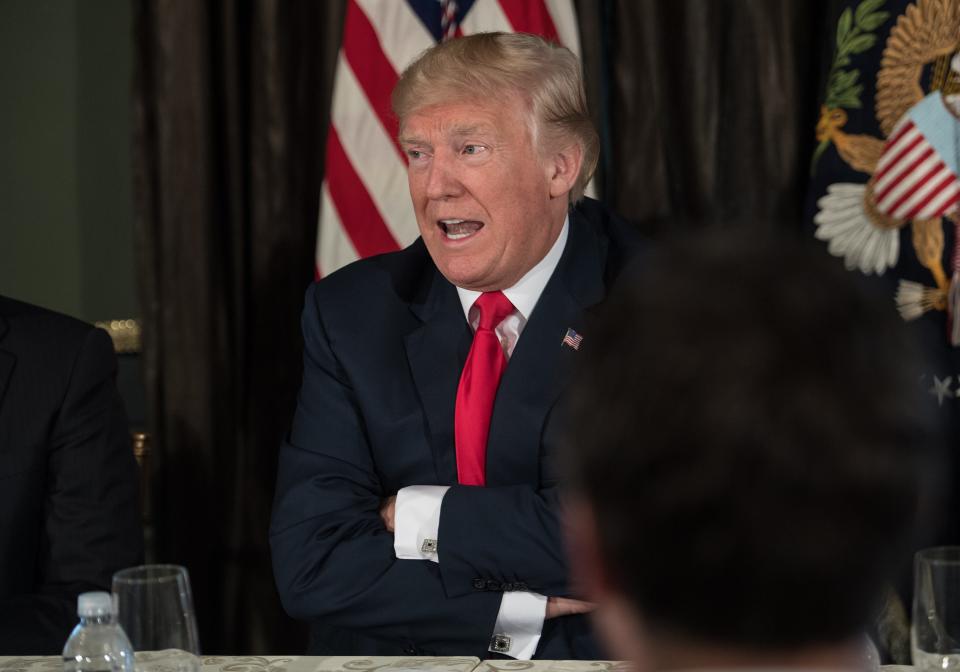 President Donald Trump talks&nbsp;about North Korea at a meeting with administration officials on the opioid addiction crisis at the Trump National Golf Club in Bedminster, New Jersey, on Monday. (Photo: NICHOLAS KAMM via Getty Images)