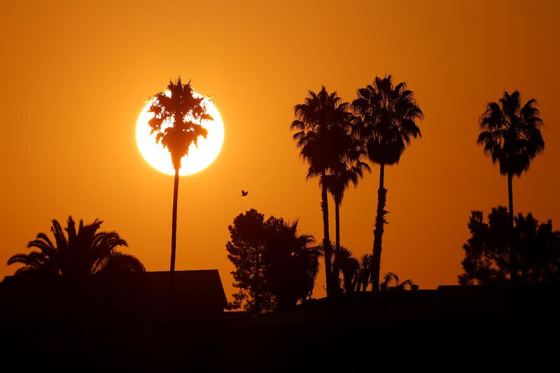 FILE PHOTO: Sun rises to begin another day during heatwave in California